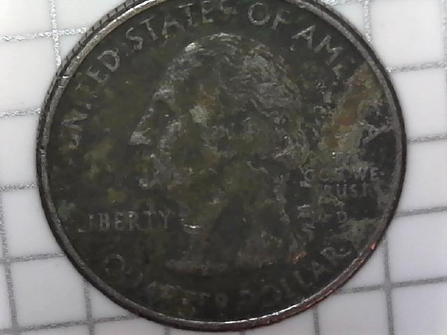 Posible-Mint-Error-Smudged-Or-Divited-Coin.-2004-Iowa-Quarter