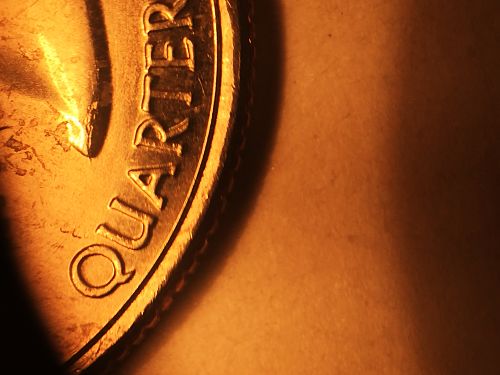 Washingtin-State-Quarter-With-Cavities-And-Cracks