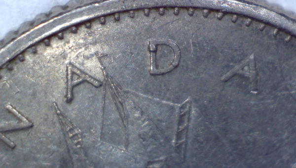 1974-Dime-With-Dot-Over-Designers-Initial-On-Reverse.