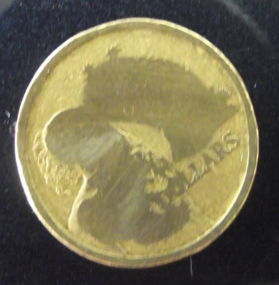 Anybody-Got-Some-Ideas-On-This-2006-2-Dollar?
