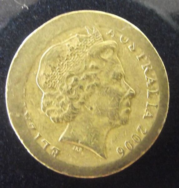 Anybody-Got-Some-Ideas-On-This-2006-2-Dollar?