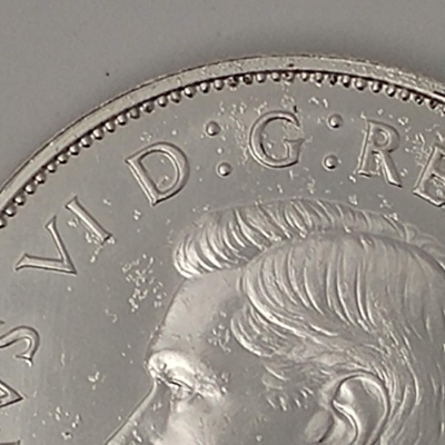 Uncirculated-King-George-50-Cent-Piece-With-Die-Chips?-Or....?