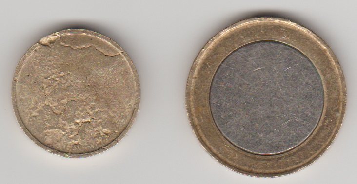 Fake-£1
