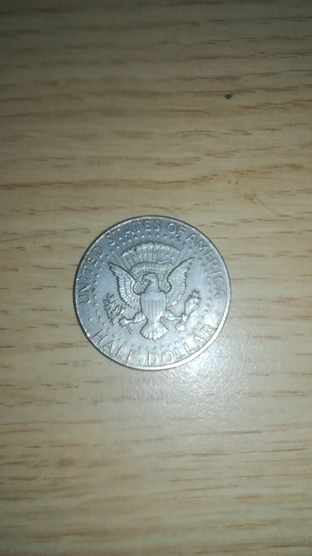 Brit-With-A-Kennedy-Half-Dollar-Seeking-Info