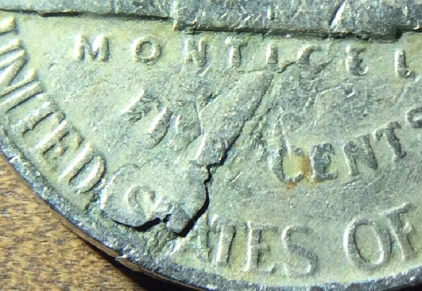 Severe-Lamination-Error,-Or-PMD?-Two-Coins