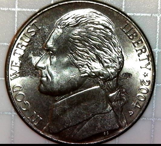 Struck-Through-Roll-Of-Nickels