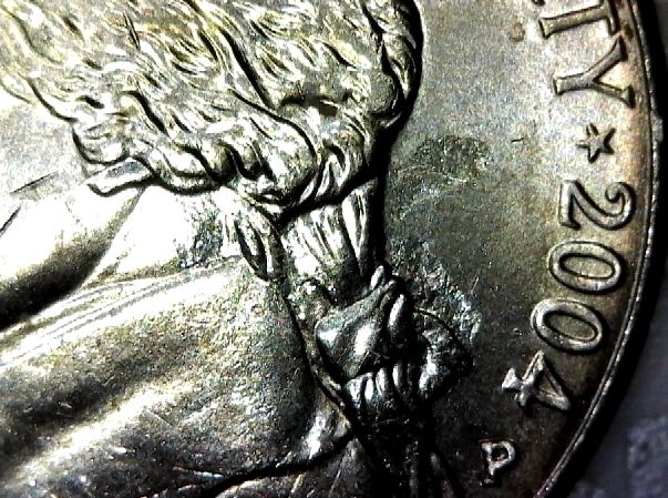 Struck-Through-Roll-Of-Nickels