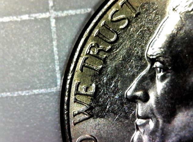 Struck-Through-Roll-Of-Nickels