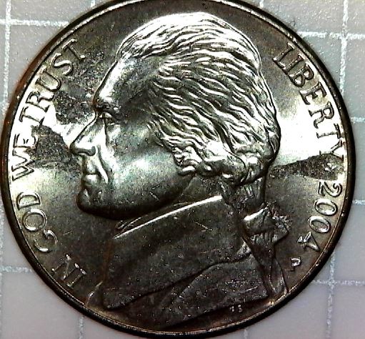 Struck-Through-Roll-Of-Nickels
