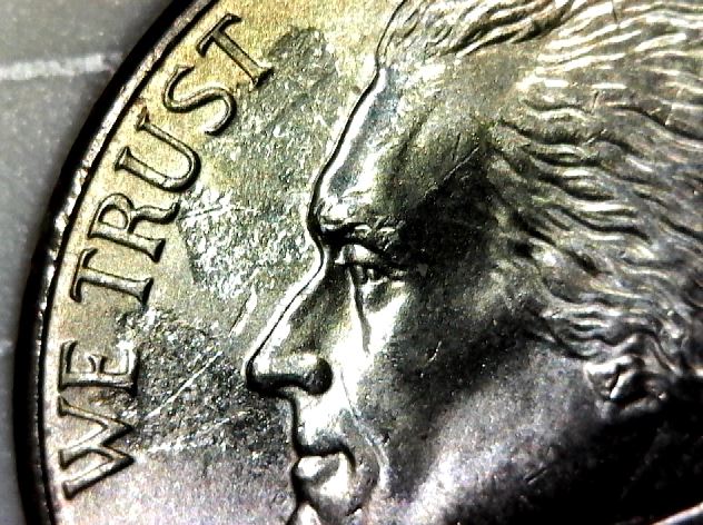 Struck-Through-Roll-Of-Nickels