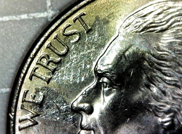 Struck-Through-Roll-Of-Nickels