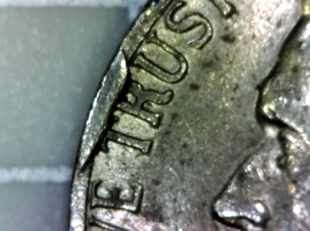 Found-1975-P-Cud-In-A-Bank-Roll:-Cu-5c-1975-03