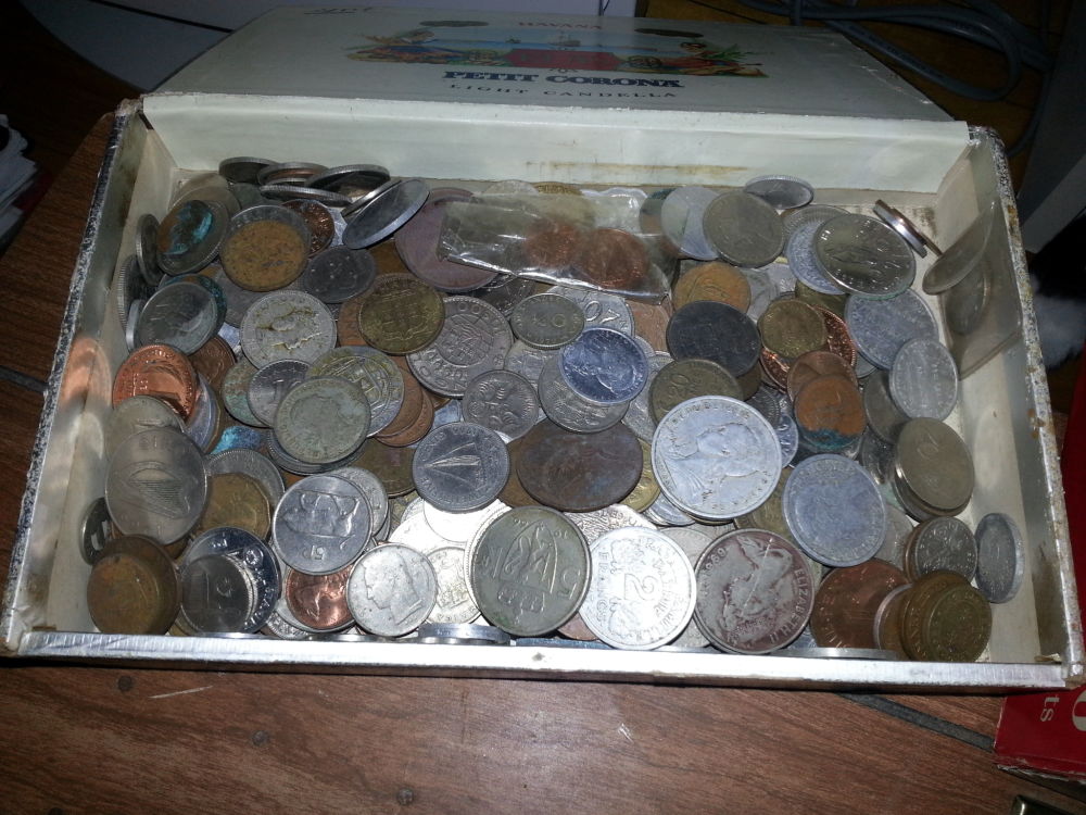 Cleaning-Off-Containers-Of-Musty-Dirty-Coins.