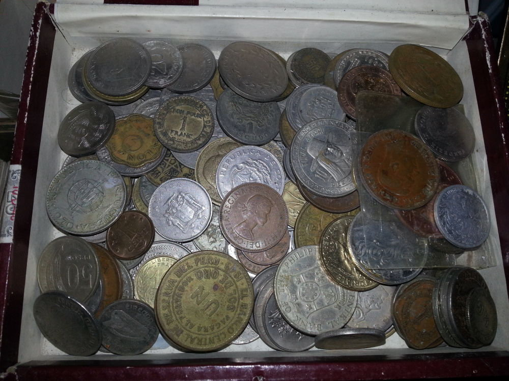 Cleaning-Off-Containers-Of-Musty-Dirty-Coins.