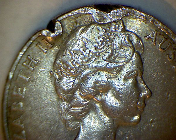 1981-20c-Coin,-Missing-Claws-And-Severe-Rim-Damage