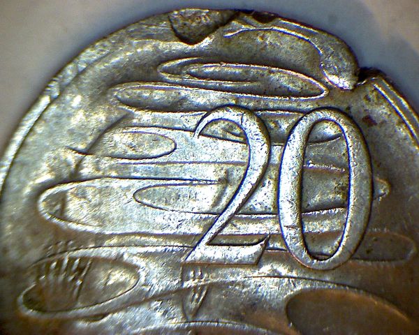 1981-20c-Coin,-Missing-Claws-And-Severe-Rim-Damage