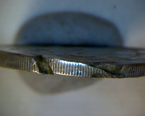 1981-20c-Coin,-Missing-Claws-And-Severe-Rim-Damage