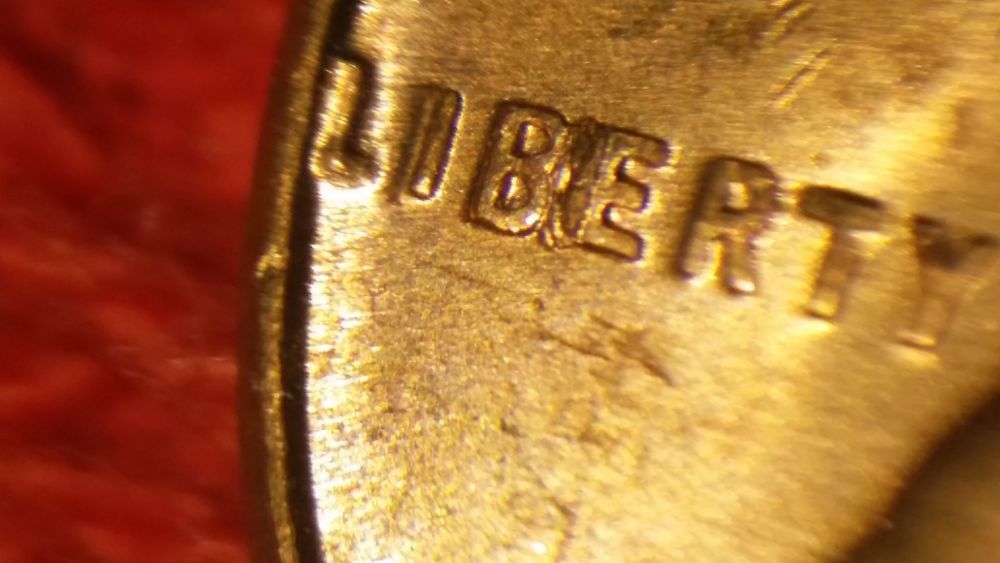 Strange-Anomaly-Or-PMD-In-Liberty-1957-Wheat-Penny