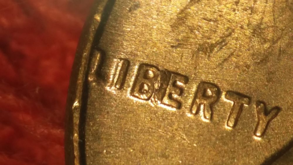 Strange-Anomaly-Or-PMD-In-Liberty-1957-Wheat-Penny