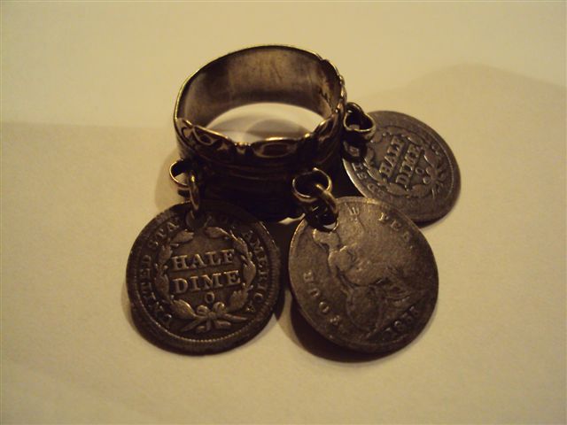 Two-1854-O-Half-DimeS-And-1855-Four-Pence...on-Ring.