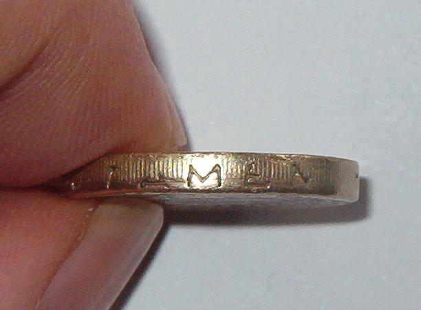 Fake-£1