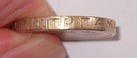 Fake-£1