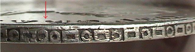 Big-E-Mark-&-Another-Mark-Stamped-On-Coin