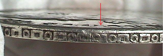 Big-E-Mark-&-Another-Mark-Stamped-On-Coin