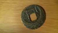 Strange-Asian-Coin.