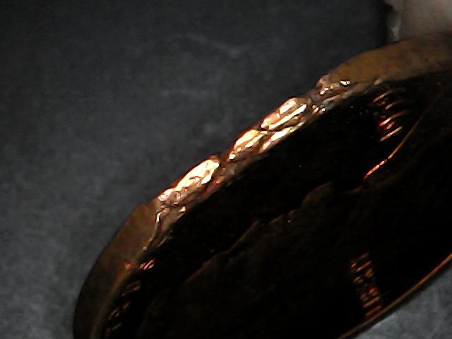 Four-Clipped-Planchets-Found-In-Bank-Rolls