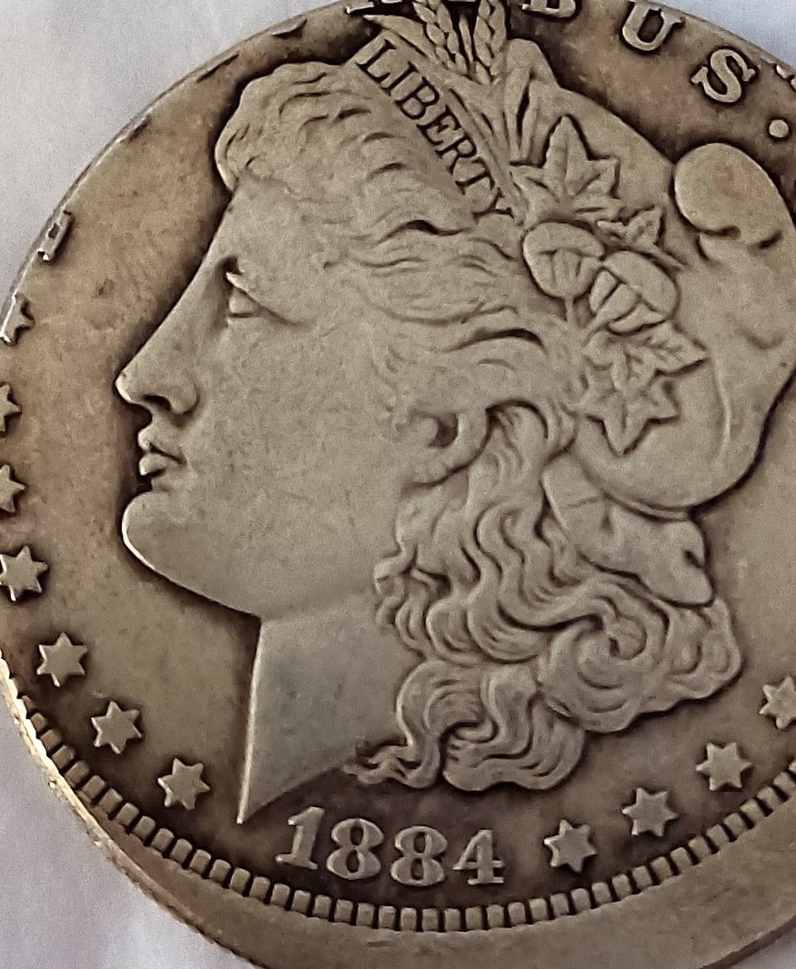 1884-O-Morgan-Silver-Dollar-Off-Center.loser.