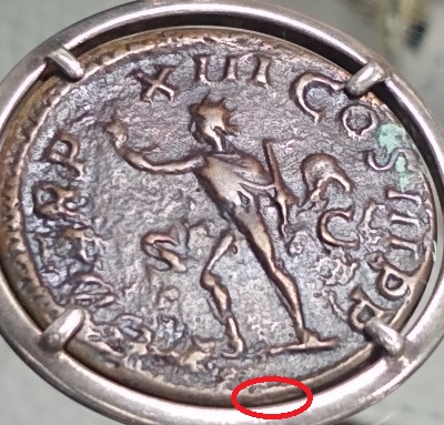 Quick-Opinion-On-A-Coin-In-A-Necklace.