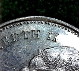 1967-Canadian-Bobcat-25c-Error,-Or-Damage?