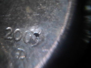 2003-Lincoln-Bullet-Holes