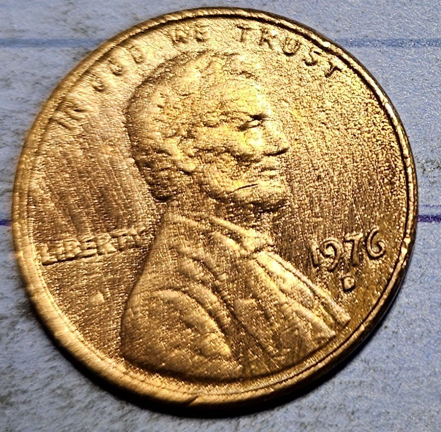 1976-D-Cent-What-Have-I-Found?--Bleb,-Occluded-Gas-Bubbles,-Flow-Lines,-Parallel-Lines?