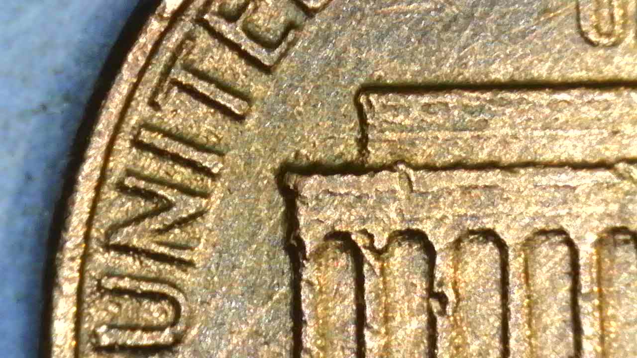 1976-D-Cent-What-Have-I-Found?--Bleb,-Occluded-Gas-Bubbles,-Flow-Lines,-Parallel-Lines?