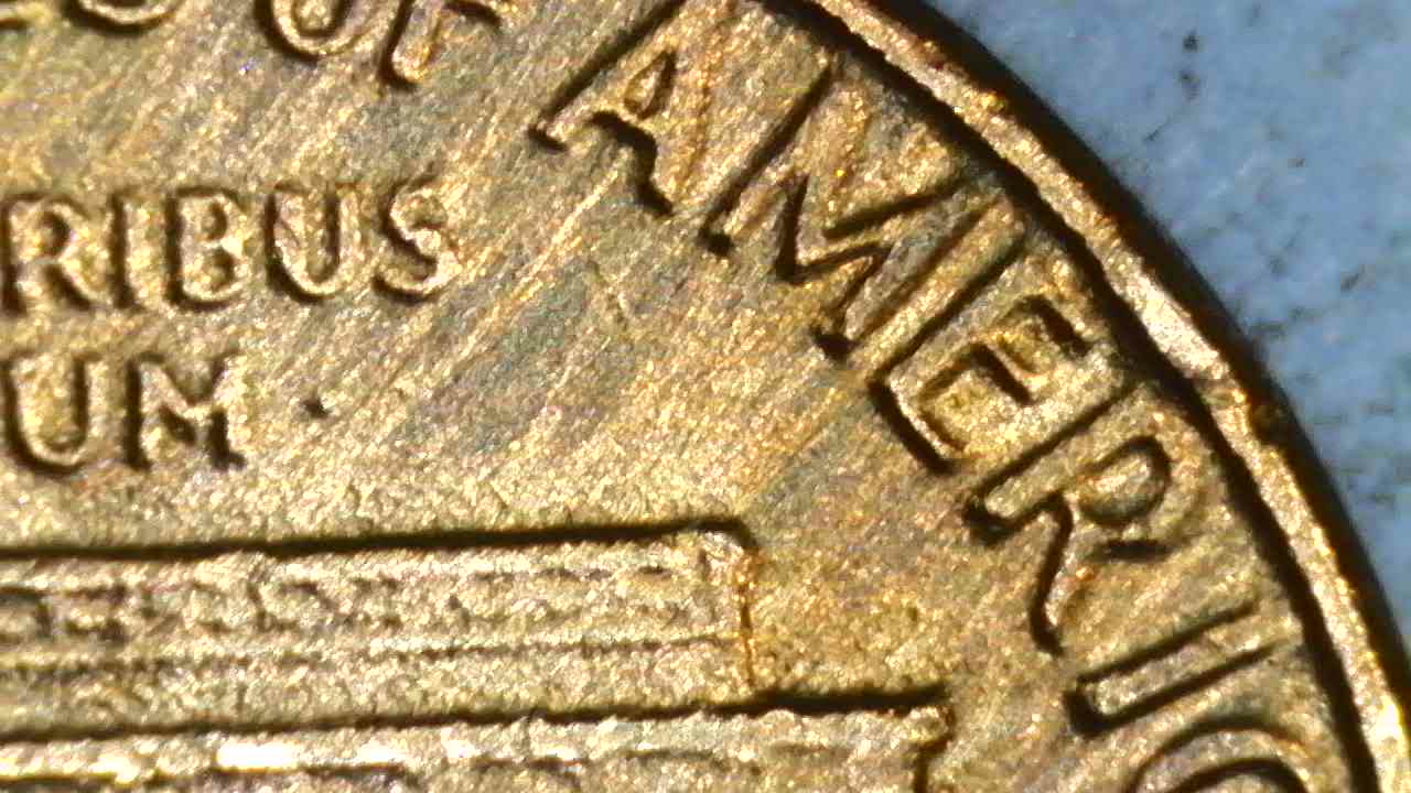 1976-D-Cent-What-Have-I-Found?--Bleb,-Occluded-Gas-Bubbles,-Flow-Lines,-Parallel-Lines?