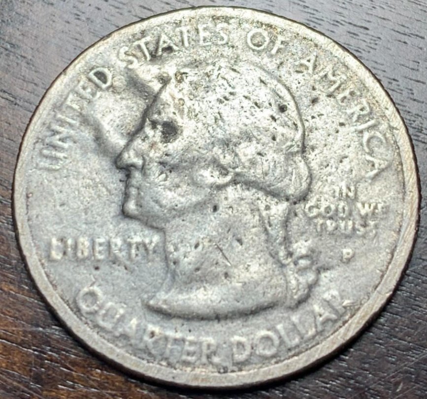 Is-This-An-Error-Or-Just-Damage?-2004-Quarter