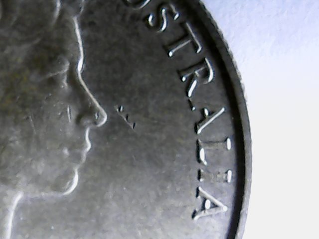 Denticle-Mark-On-1966-50-Cent