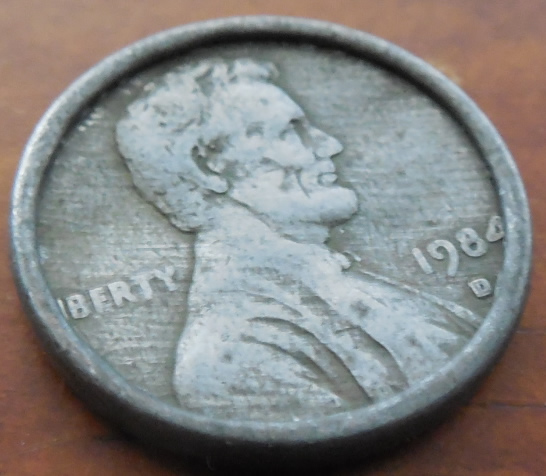 Possible-1984-D,-With-Wrong-Base-Metal-And-Large-Rimb.