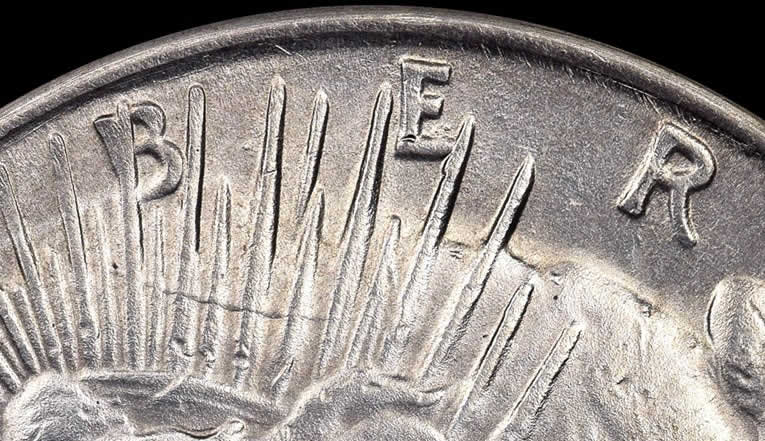 Counterfeit-Detection:-1928-Peace-Dollar