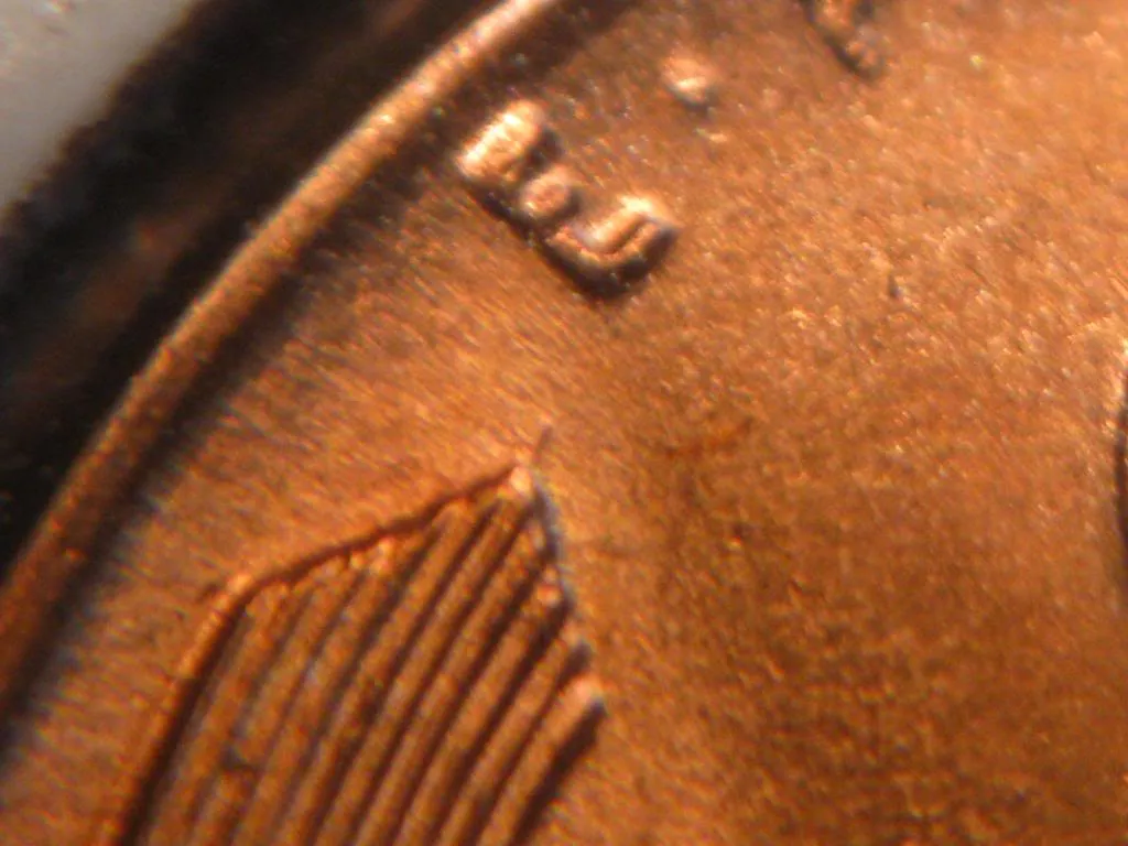 1957-LWC-With-Die-Crack-In-Lincoln's--Forehead