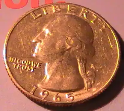 What's-With-This-1965-Washington-Quarter-Cladding?