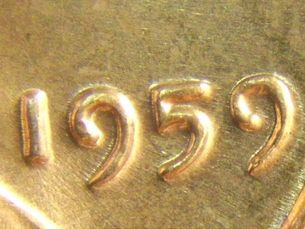 1959-Lincoln-Memorial-Cent-Cent-With-A-Doubling-In-Liberty