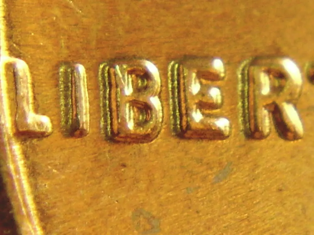 1959-Lincoln-Memorial-Cent-Cent-With-A-Doubling-In-Liberty