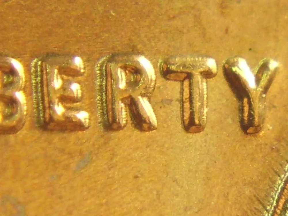 1959-Lincoln-Memorial-Cent-Cent-With-A-Doubling-In-Liberty