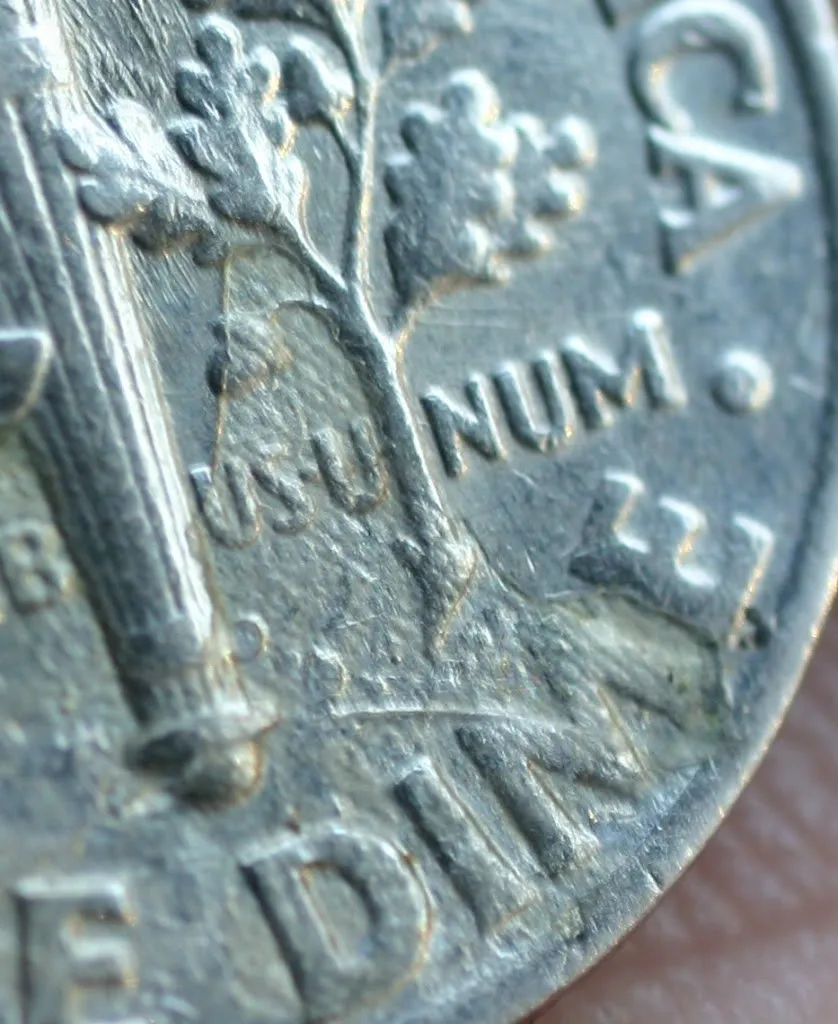 1986-P-Dime-Partial-Struck-Through-Cloth?