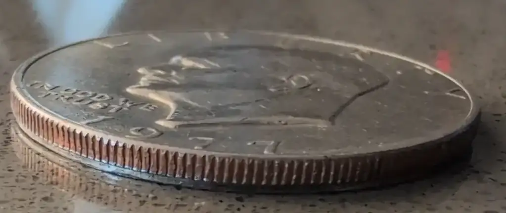 1977-Eisenhower-Dollar-With-Railroad-Rim
