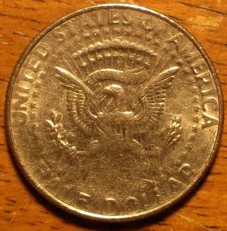 Kennedy-Half-Dollar:--Struck-Through-Obverse-&-Reverse?