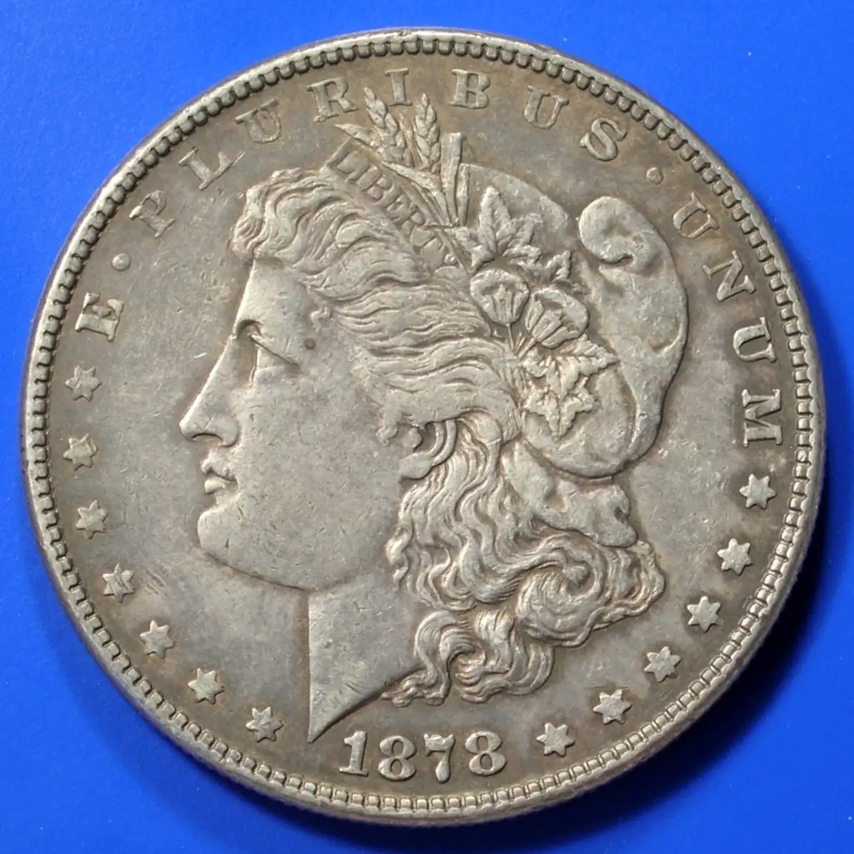 Morgan-Dollar-1878,-7/8-Tailfeathers
